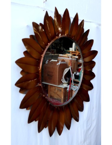 Specchio metallo brunito a formare un fiore...