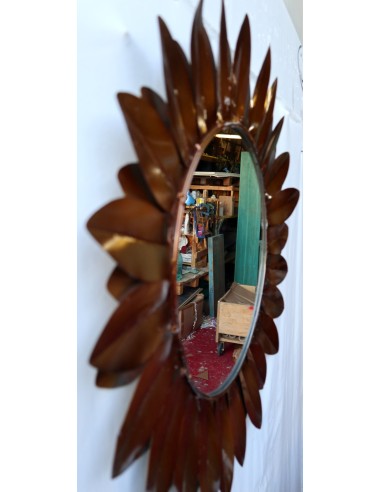 Specchio metallo brunito a formare un fiore...