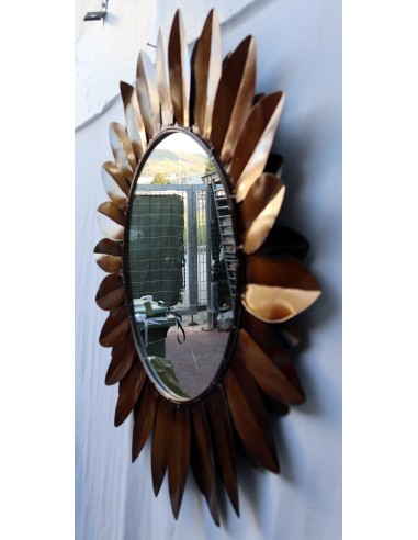 Specchio metallo brunito a formare un fiore...