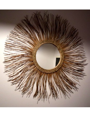 Specchio in rattan naturale a forma di un sole...