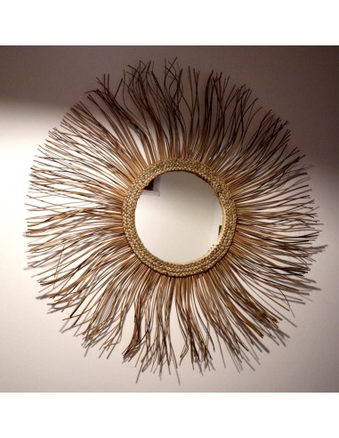 Specchio in rattan naturale a forma di un sole...