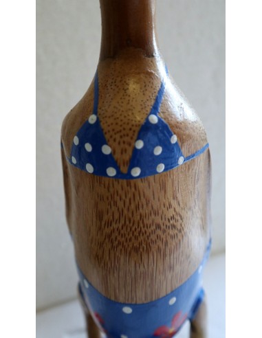 Oca papera in legno in costume da bagno blu con...